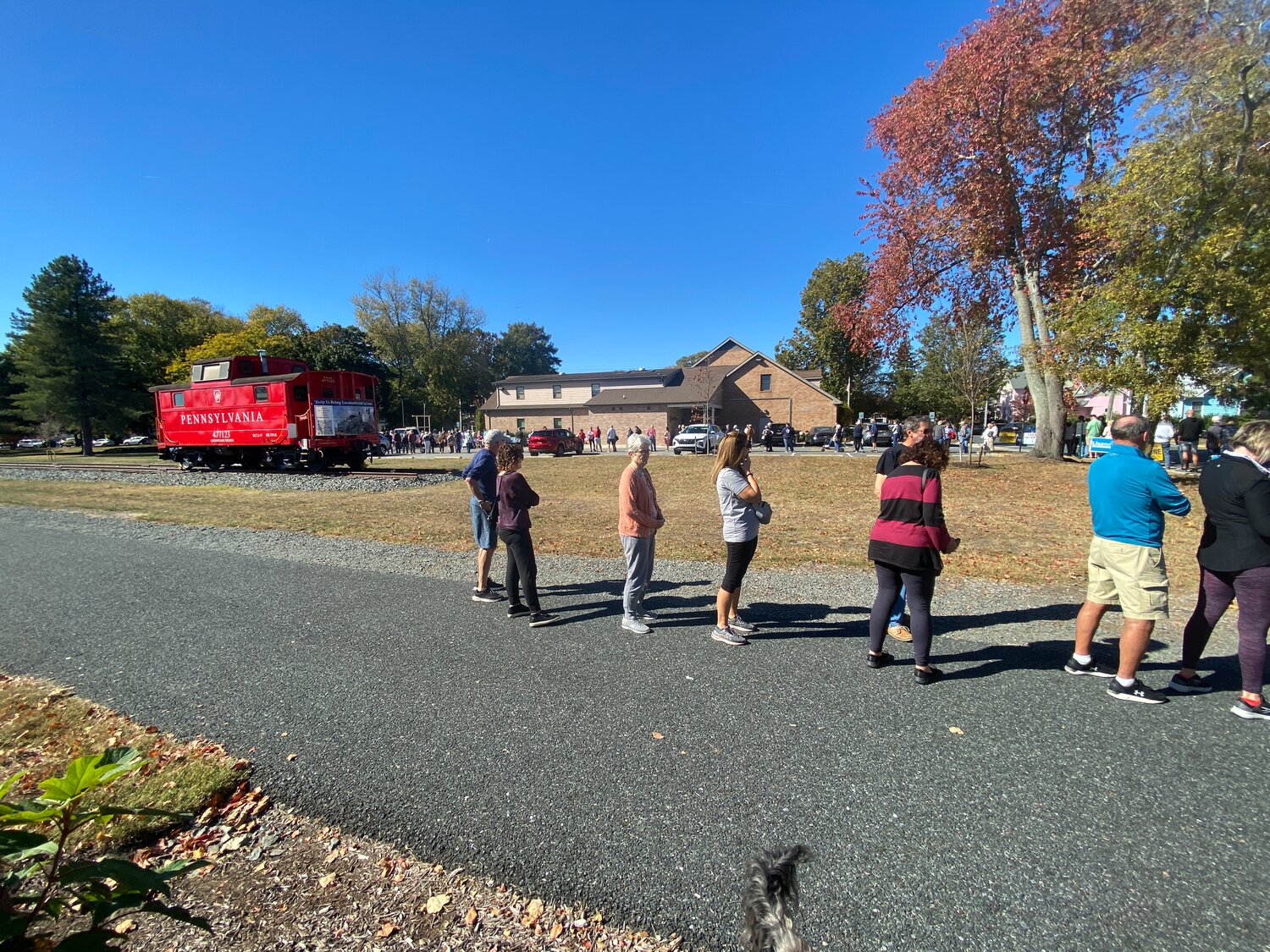 Early voting lines wrap around Margaret Rollins Community Center in