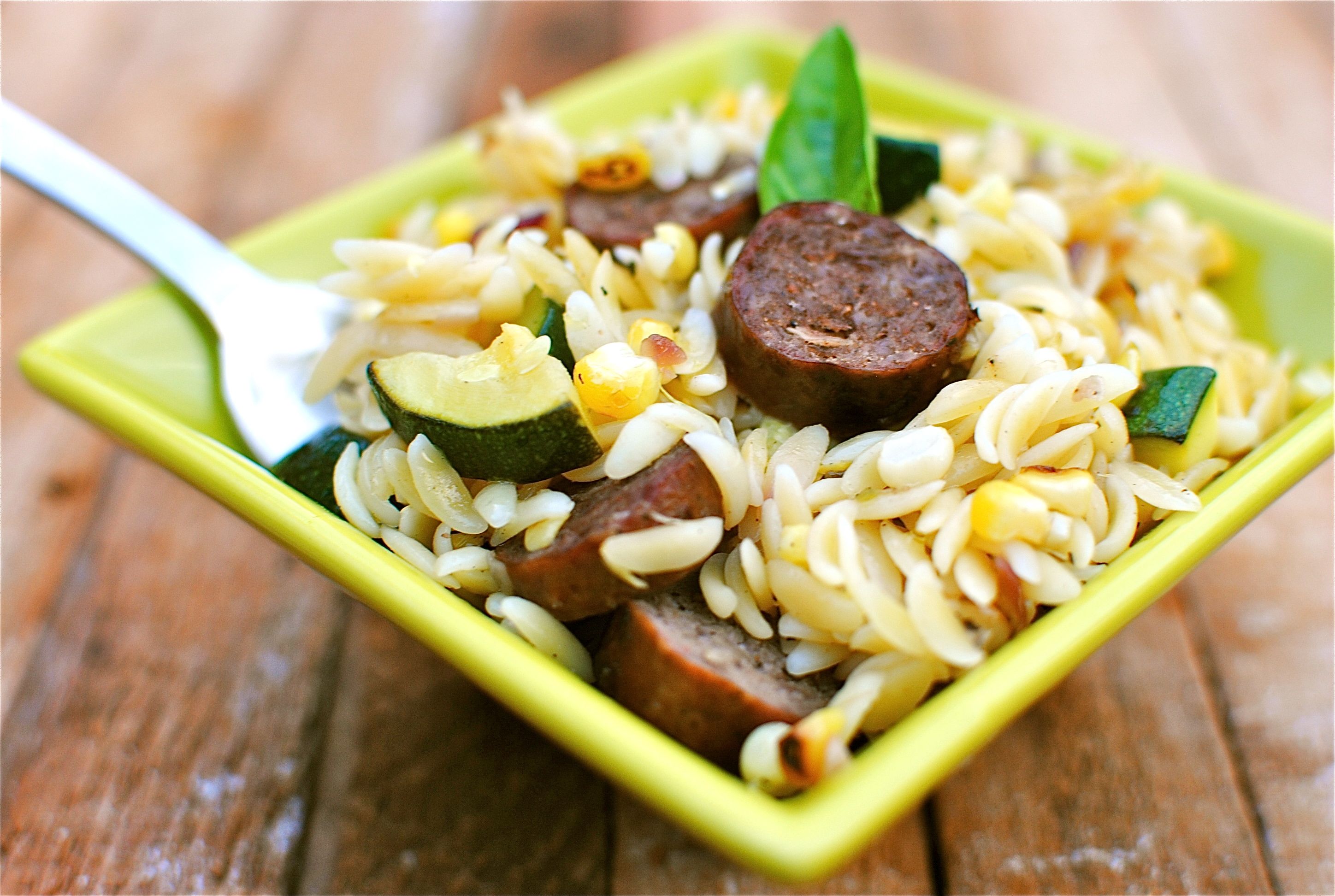 Orzo with Corn, Zucchini and Spicy Sausages Bev Cooks