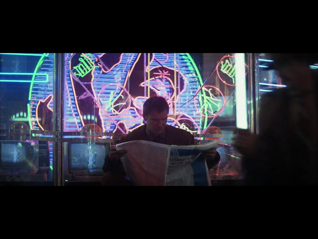 Deckard Reading (Blade Runner) Biblioklept