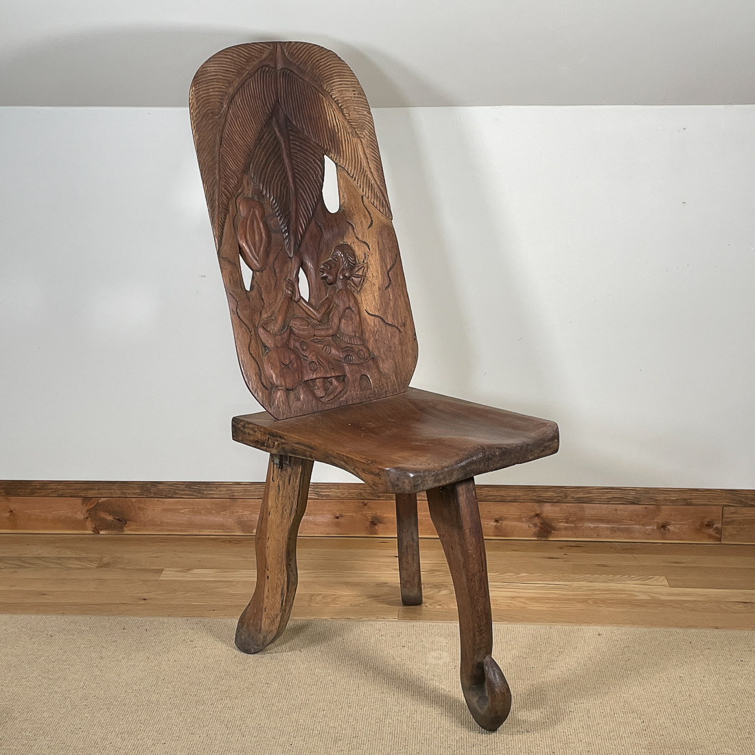 CARVED AFRICAN CHAIR