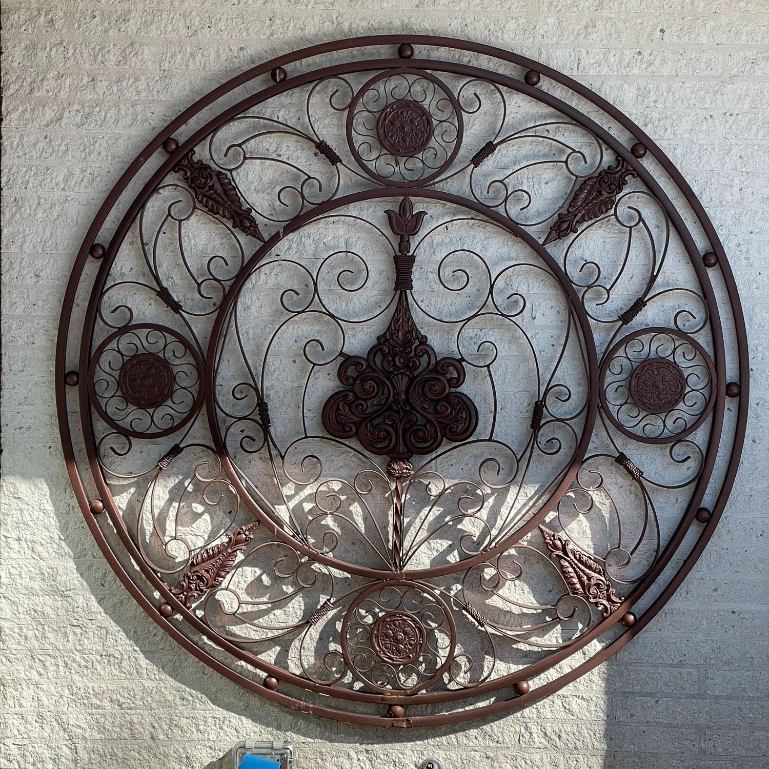 PAINTED IRON WALL PLAQUE