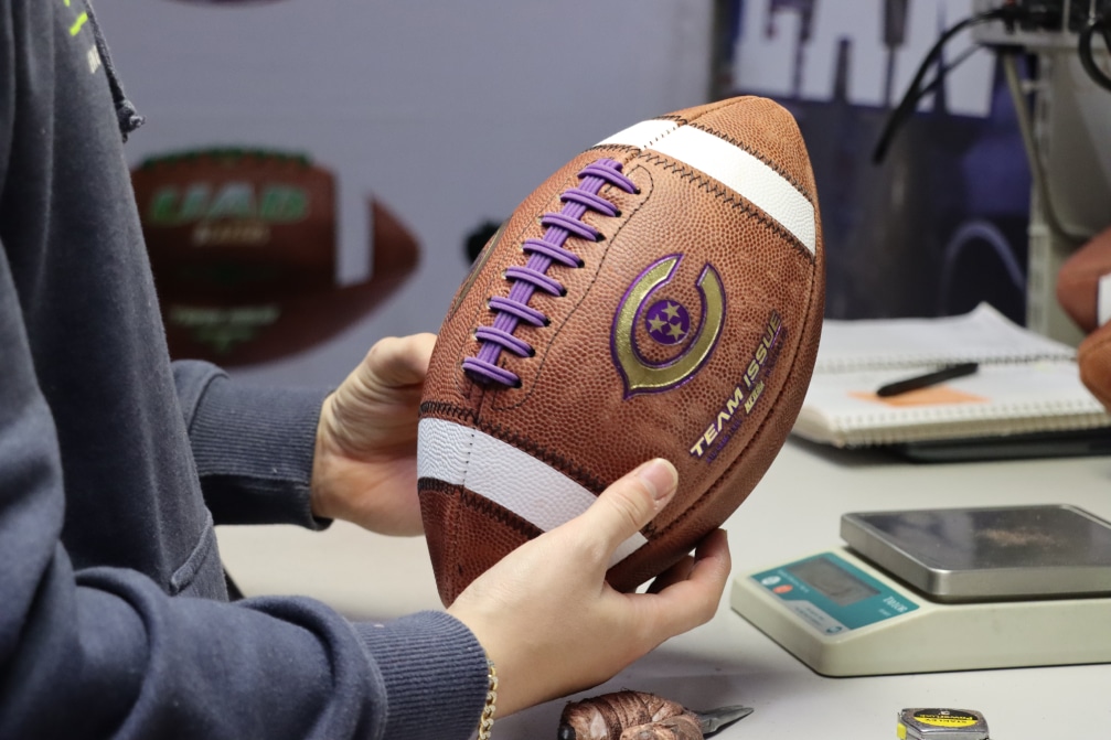 From Pigskin to Pebbled Leather How Modern American Footballs Evolved