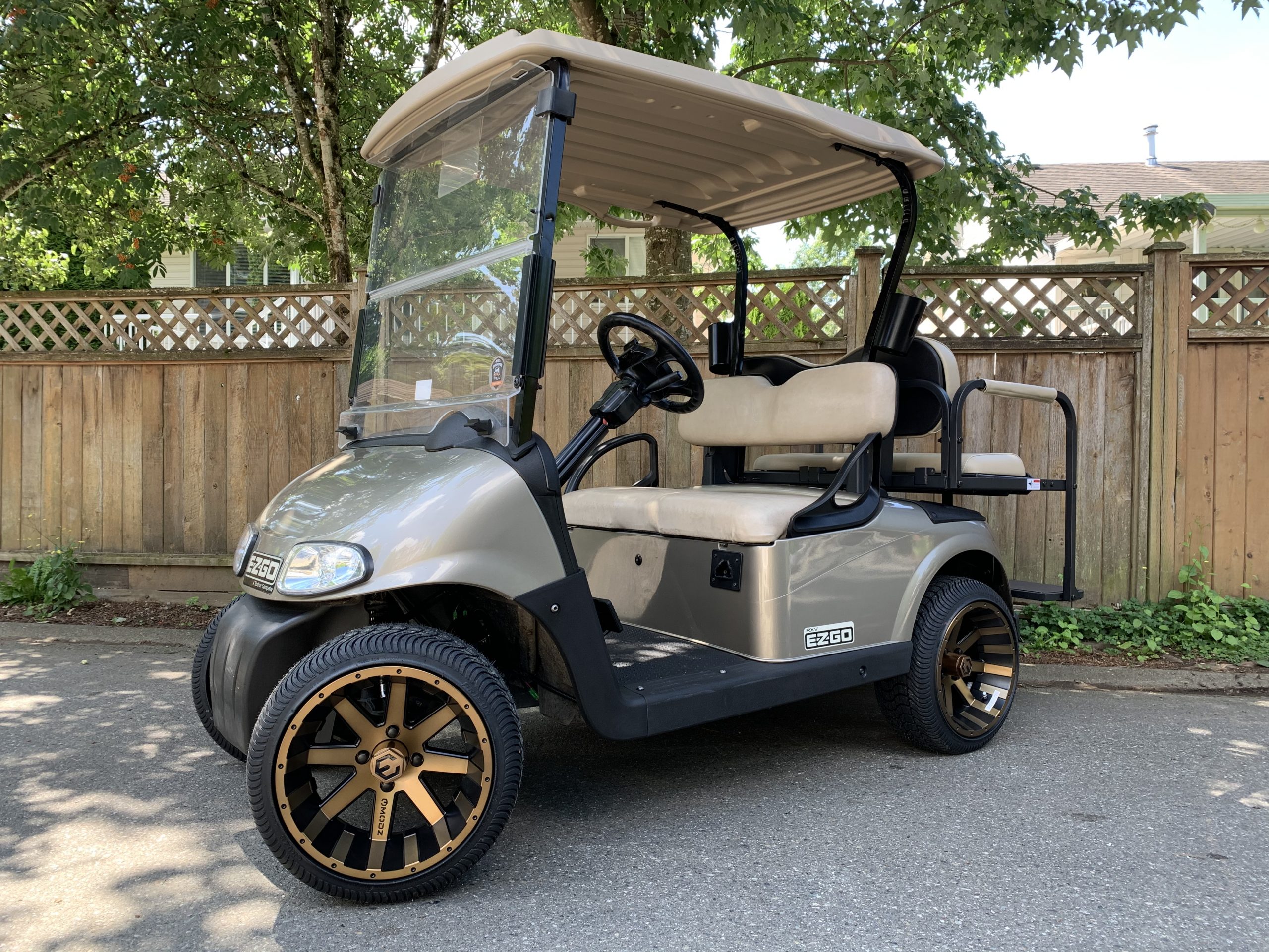 Custom Almond EZGO RXV 2+2 with Bronze Wheels Big Thunder Golf Carts