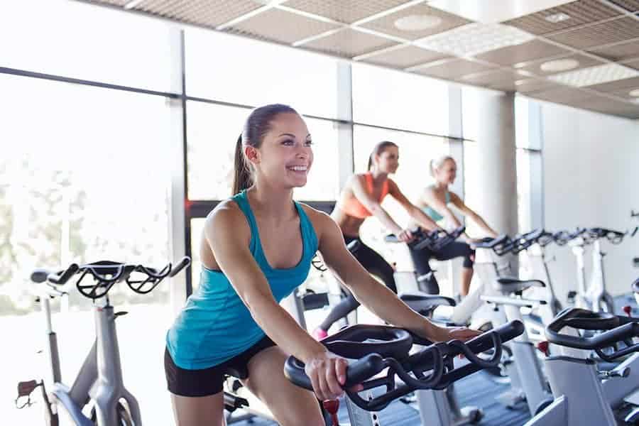 16 Stationary Bike Workout Plans To Achieve Your Fitness Goals