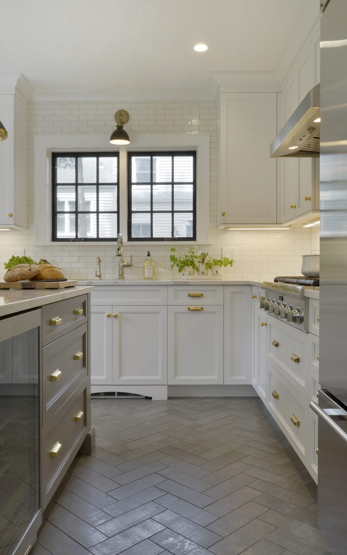 All White Kitchen with Herringbone Floor Bilotta Kitchen & Home