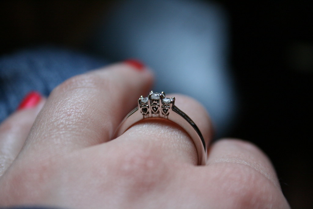 ENGAGEMENT RING MIDDLE FINGER