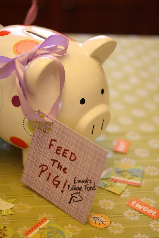 Cute Baby Shower Idea using a piggy bank to collect change for the baby