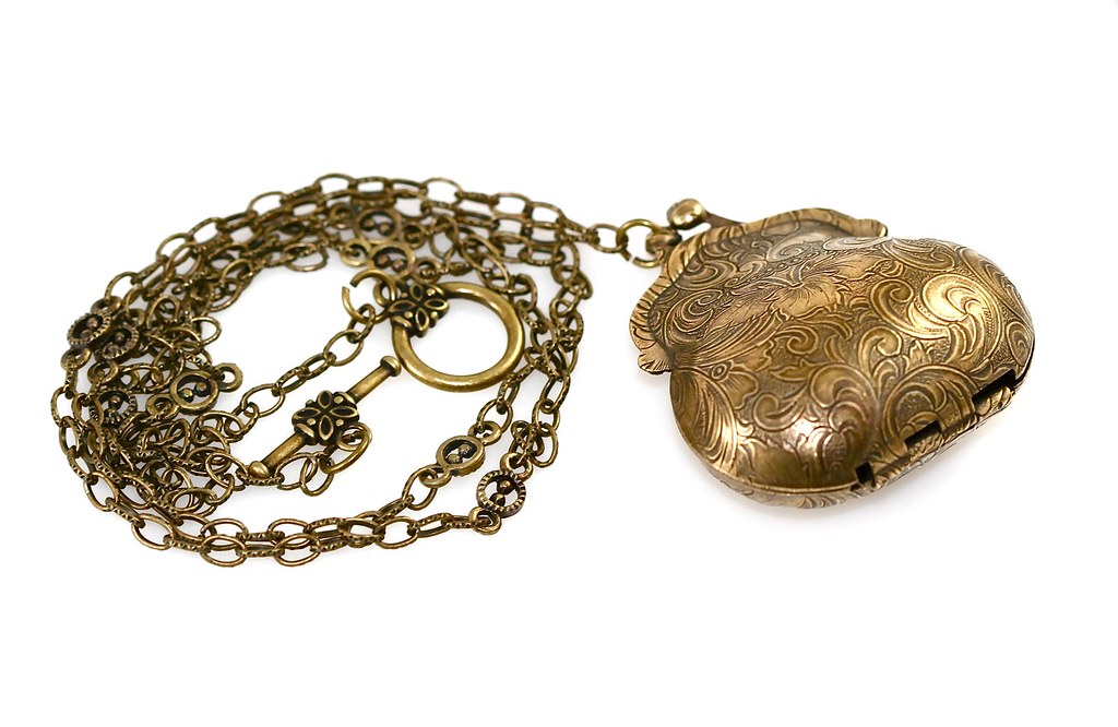 ANTIQUE BRASS DRAPERY HARDWARE