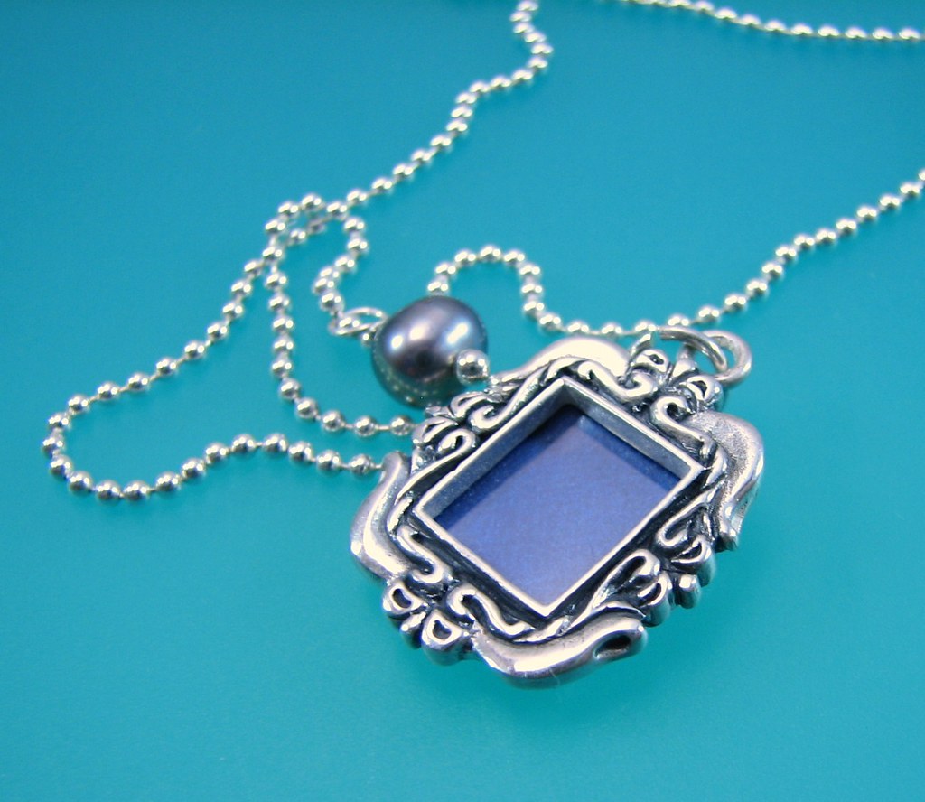 SILVER PHOTO FRAME CHARMS. SILVER PHOTO 1884 TRADE SILVER DOLLAR