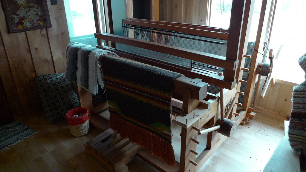 ANTIQUE SPINNING WHEELS AND LOOMS