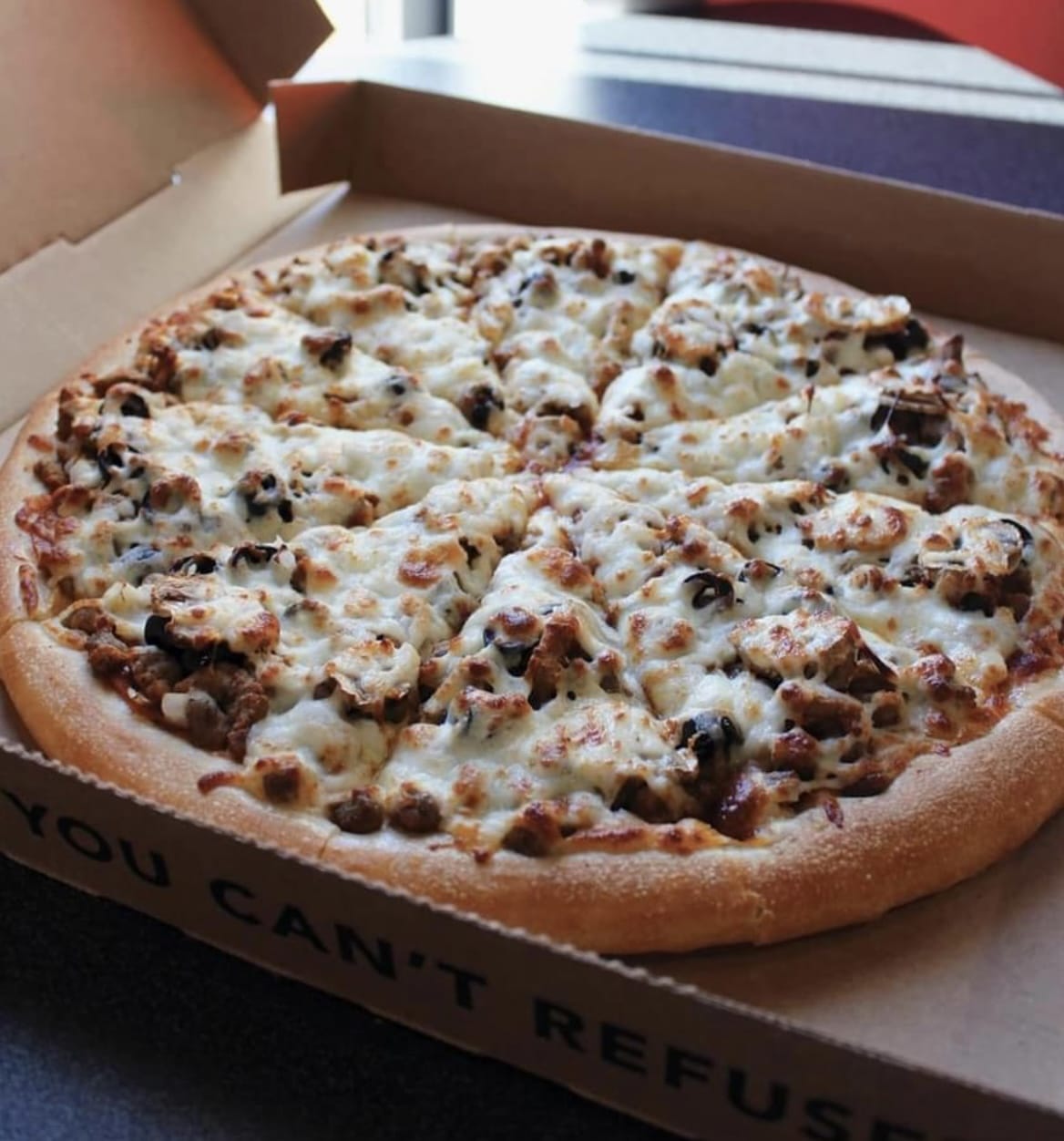 GodFather’s Pizza Spring Location features Pizzeria cuisine in Spring