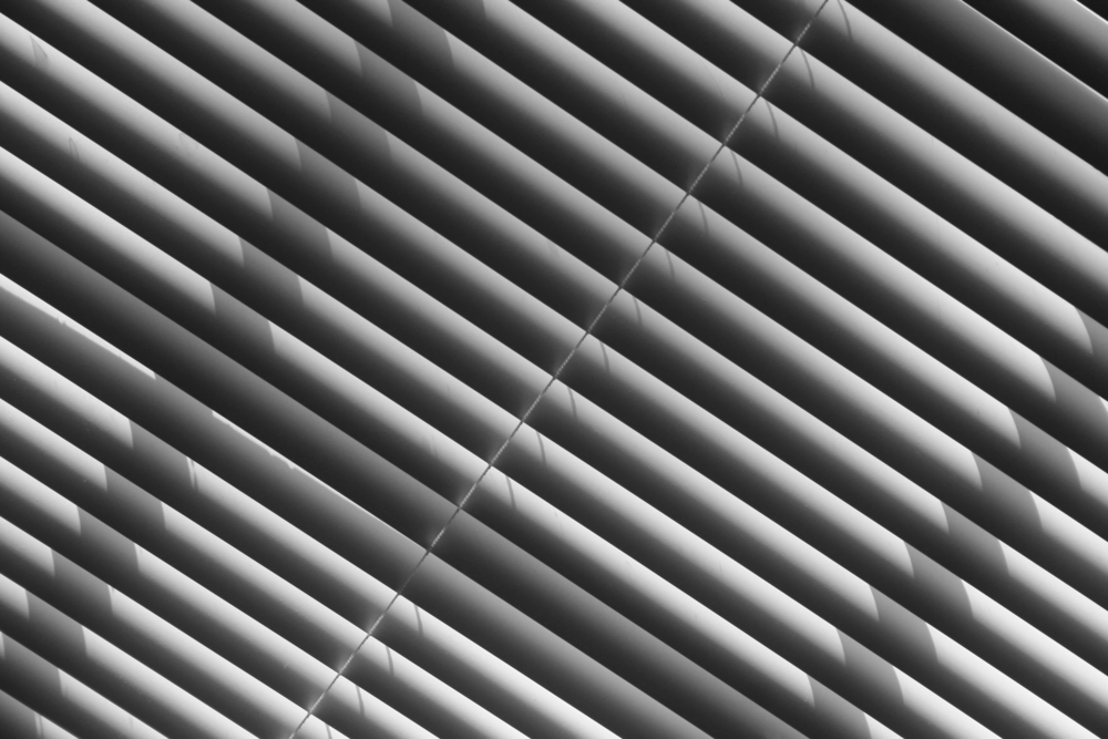 Mini Blinds vs. Faux Wood Blinds Pros and Cons