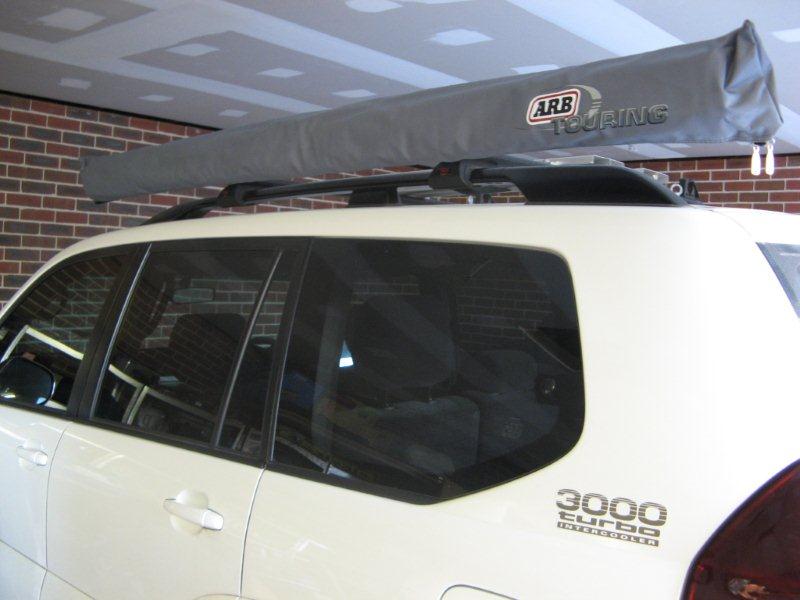 Arb roof awning on rhino sports racks Toyota Prado How To's