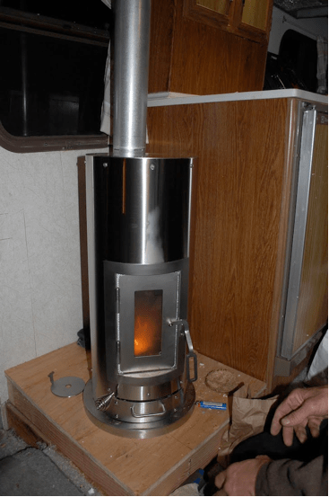 Tiny House From Reclaimed Wood | Reclaimed Wood Blog | Tiny Wood Stove, Tiny House Wood Stove, Wood Stove Why You Should Have A Kimberly Wood Stove In Your Motorhome - Rvshare.com