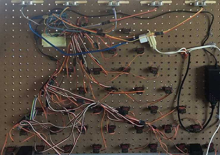 Three dozen servos create animated artwork Arduino Blog