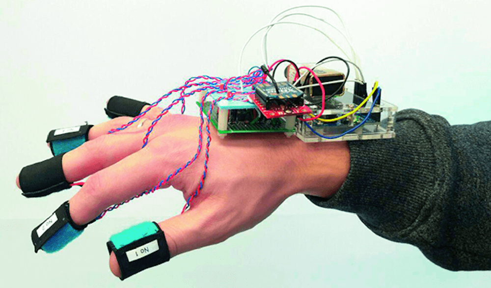 Arduino Blog » Control a swarm of drones with this wearable tactile device