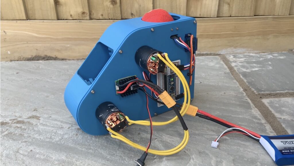 This Arduinocontrolled ball launcher lets your pup play fetch for