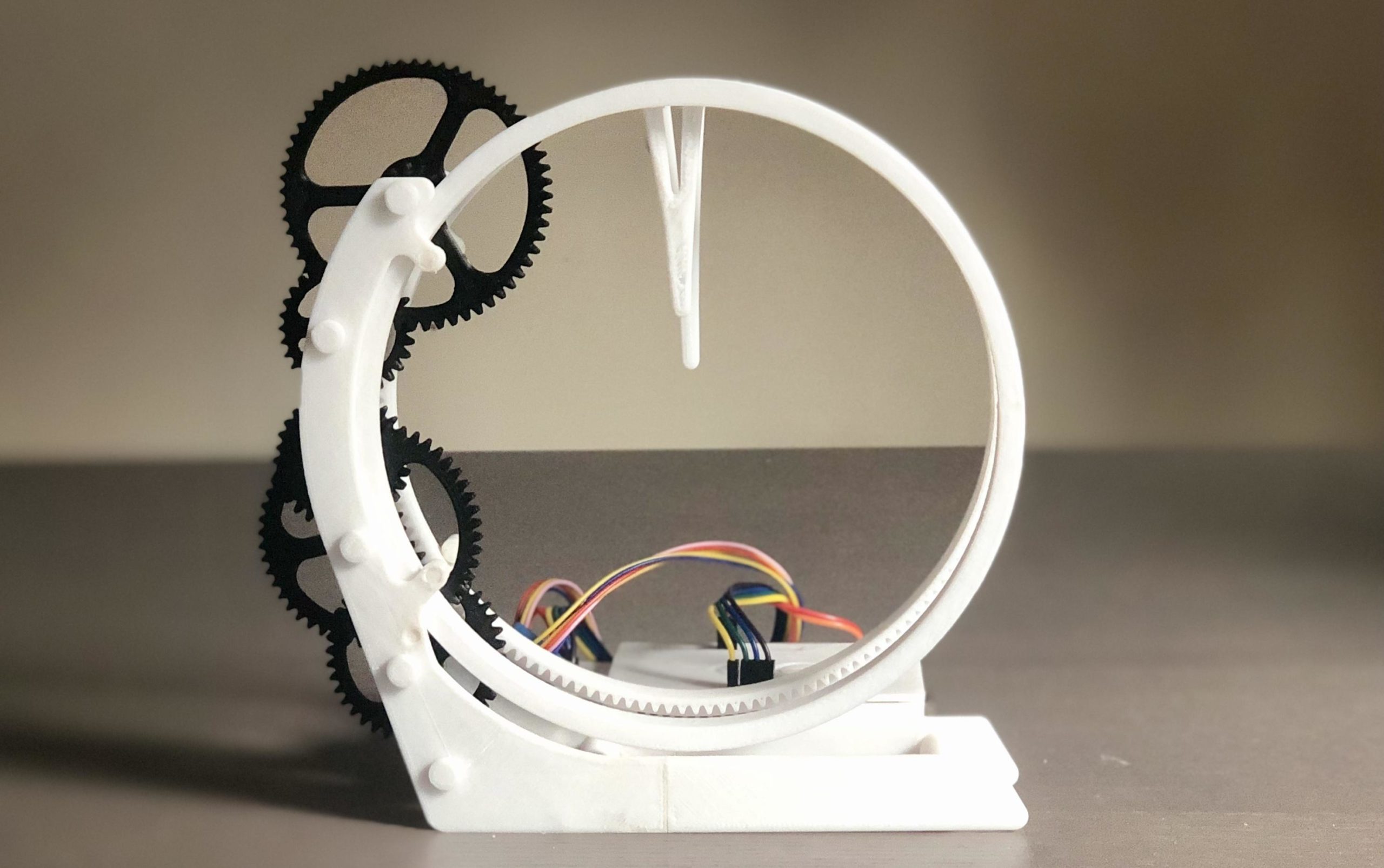 Holo Clock is a novel 3Dprinted clock that tells time using a pair of