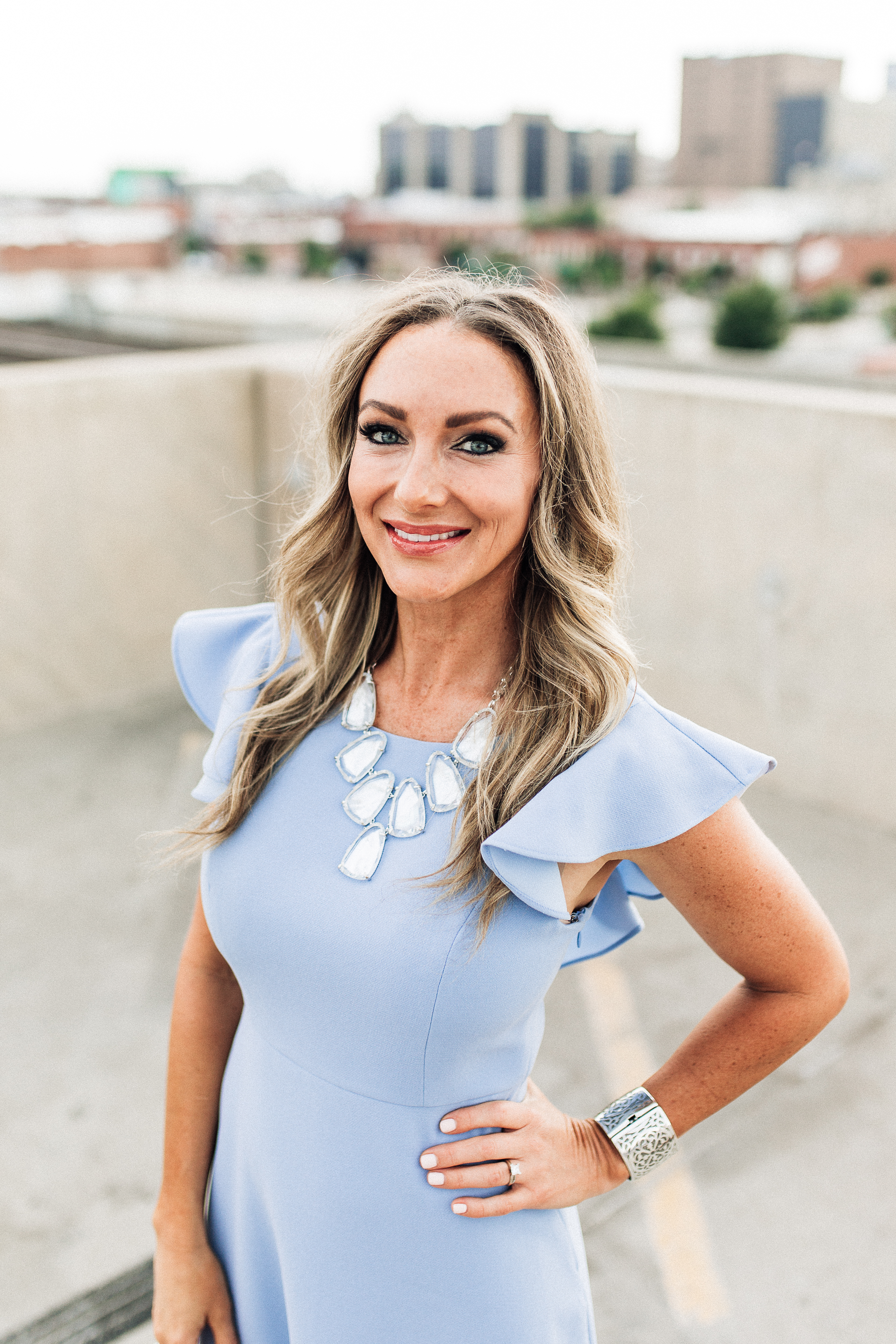 dr. denise dopps with wichita kansas skyline