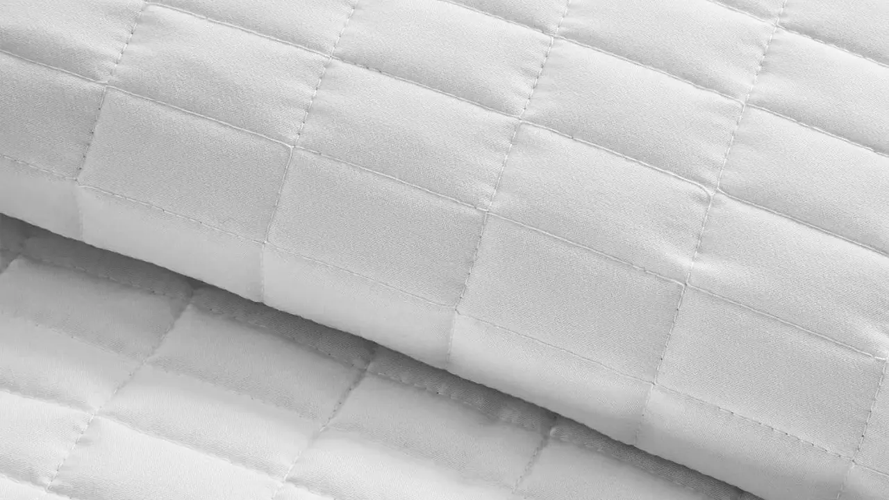 Thread Count and Materials What Makes A Luxury Quilt? Textile