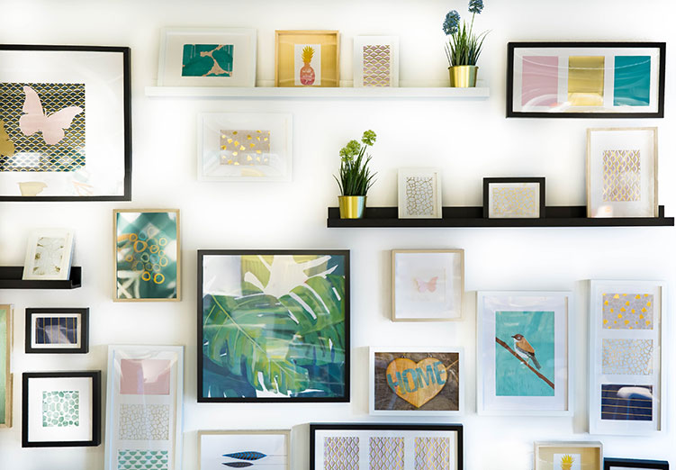 Assorted picture frames on a wall