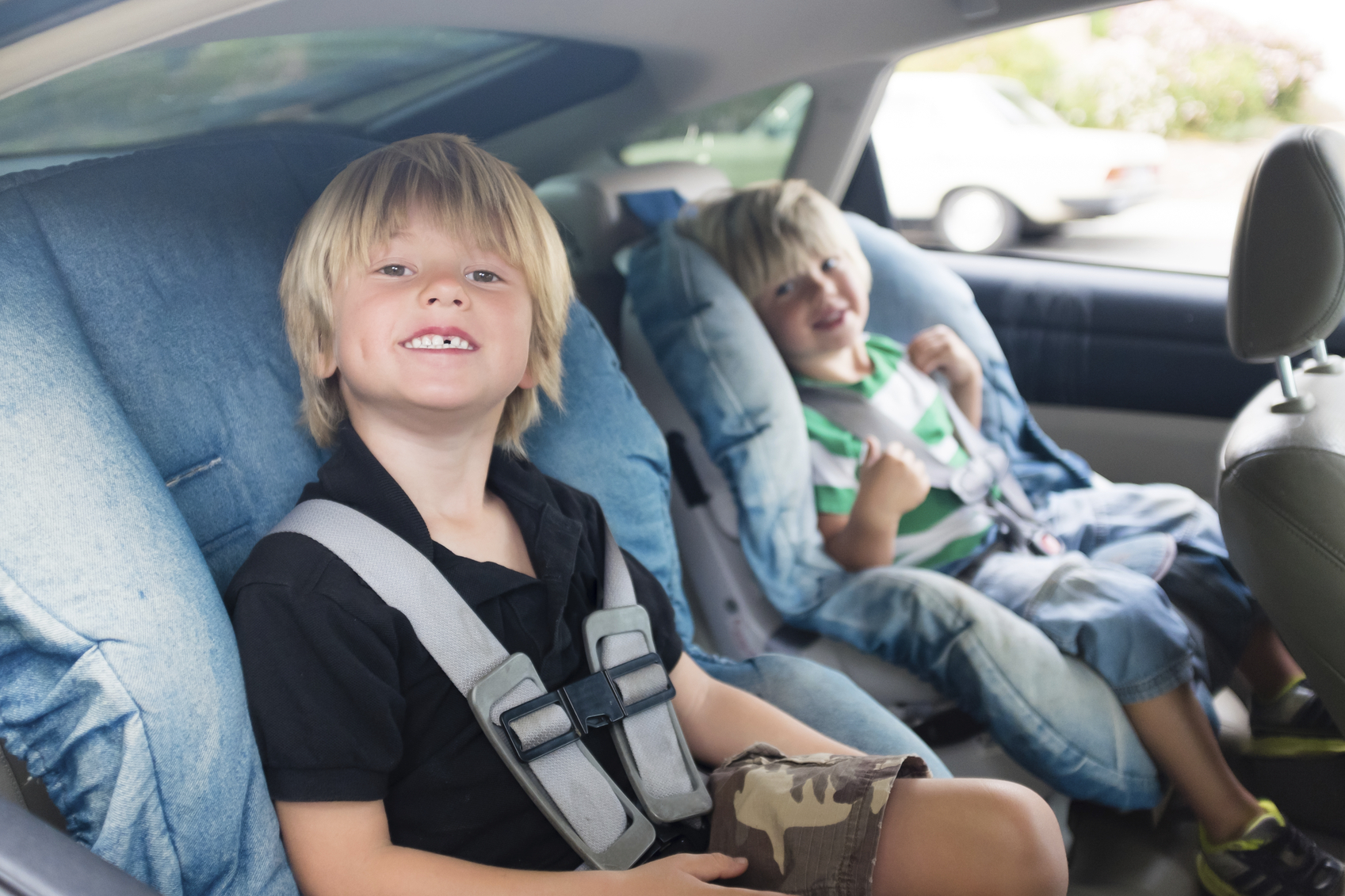Brothers In Car Seats Green Flag