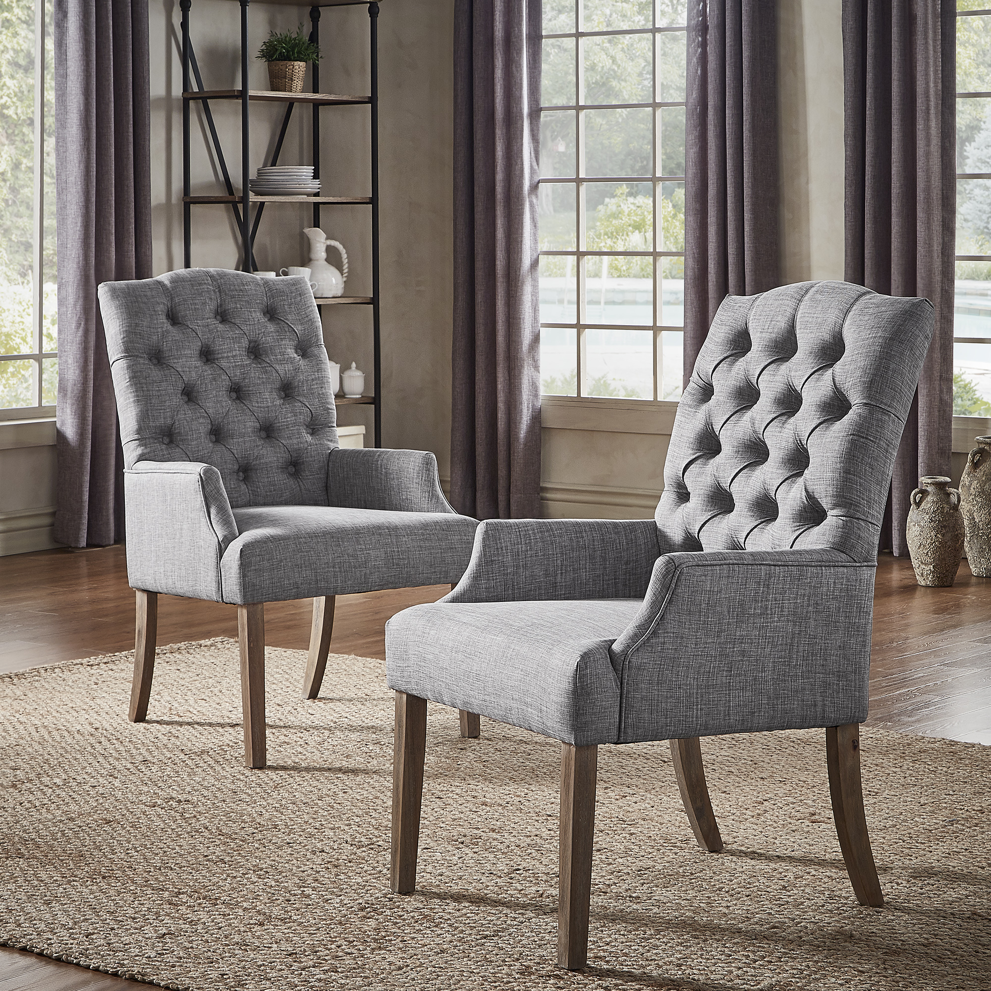 This is the iNSPIRE Q Artisan button-tufted linen hostess chair. It features soft linen upholstery and plush button tufting so you can work in total comfort.