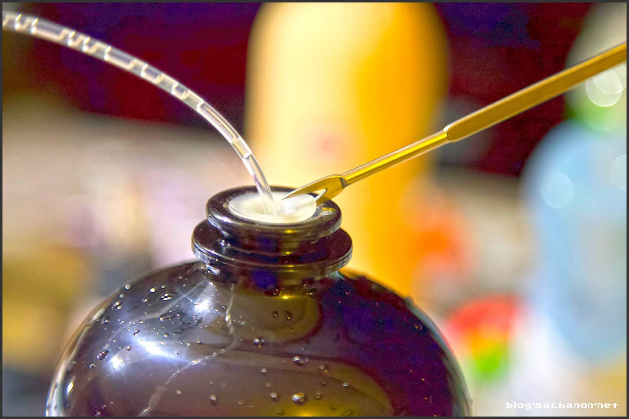 Carefully insert the seafood fork between the cap and TORP neck.