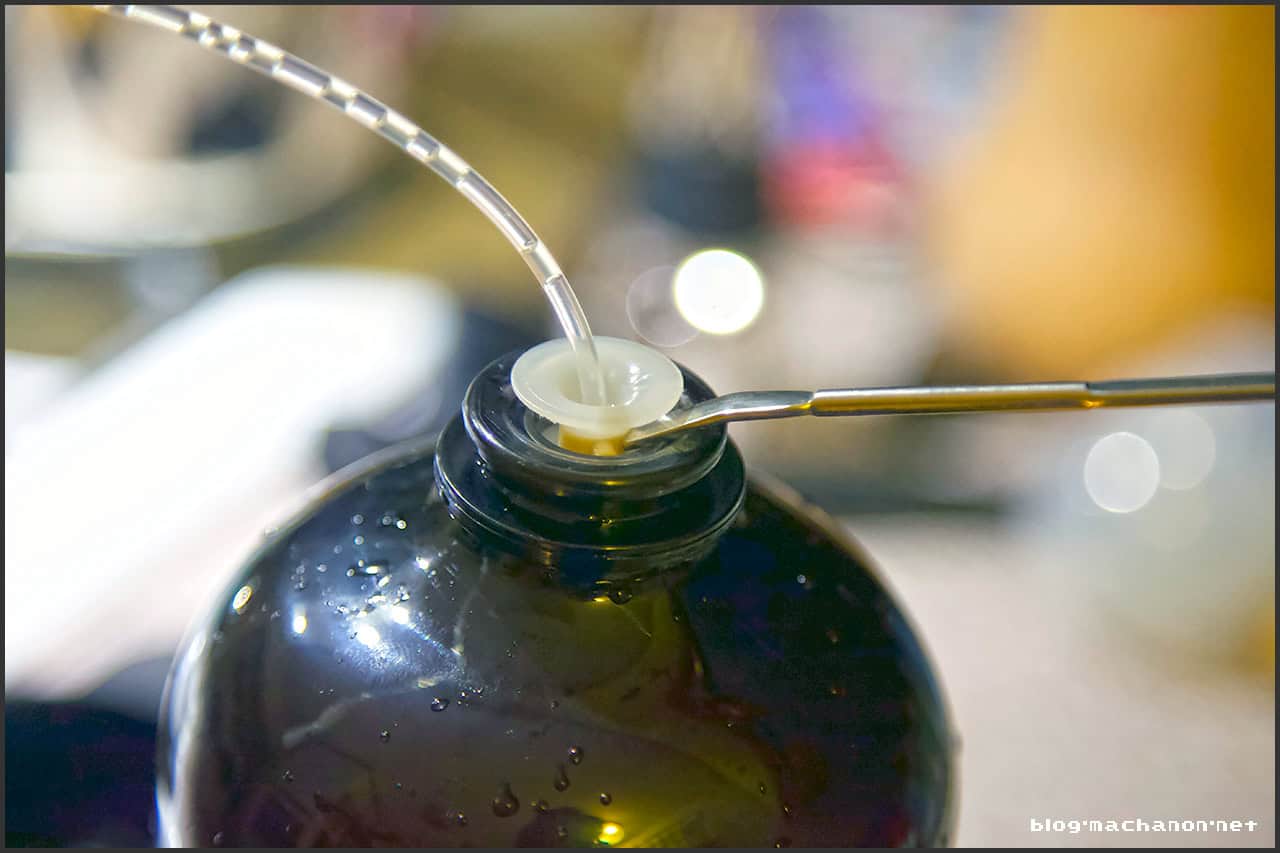 Switch to the paddle end of the seafood fork and continue pushing up.