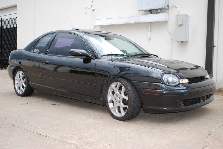 Photos of our employee Kyle’s 96 Plymouth Neon with 2.4