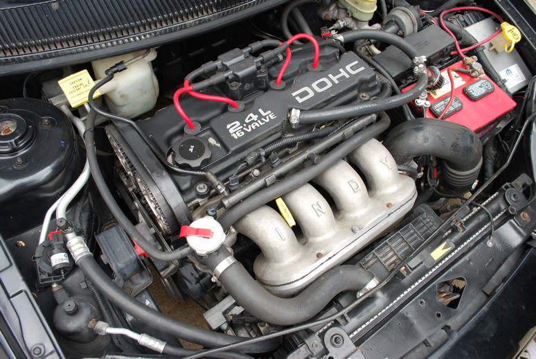 Photos of our employee Kyle’s 96 Plymouth Neon with 2.4