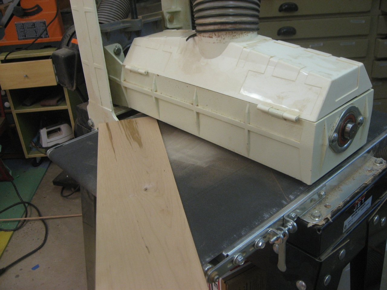 A drum sander can easily dial in the inlay thickness to match the