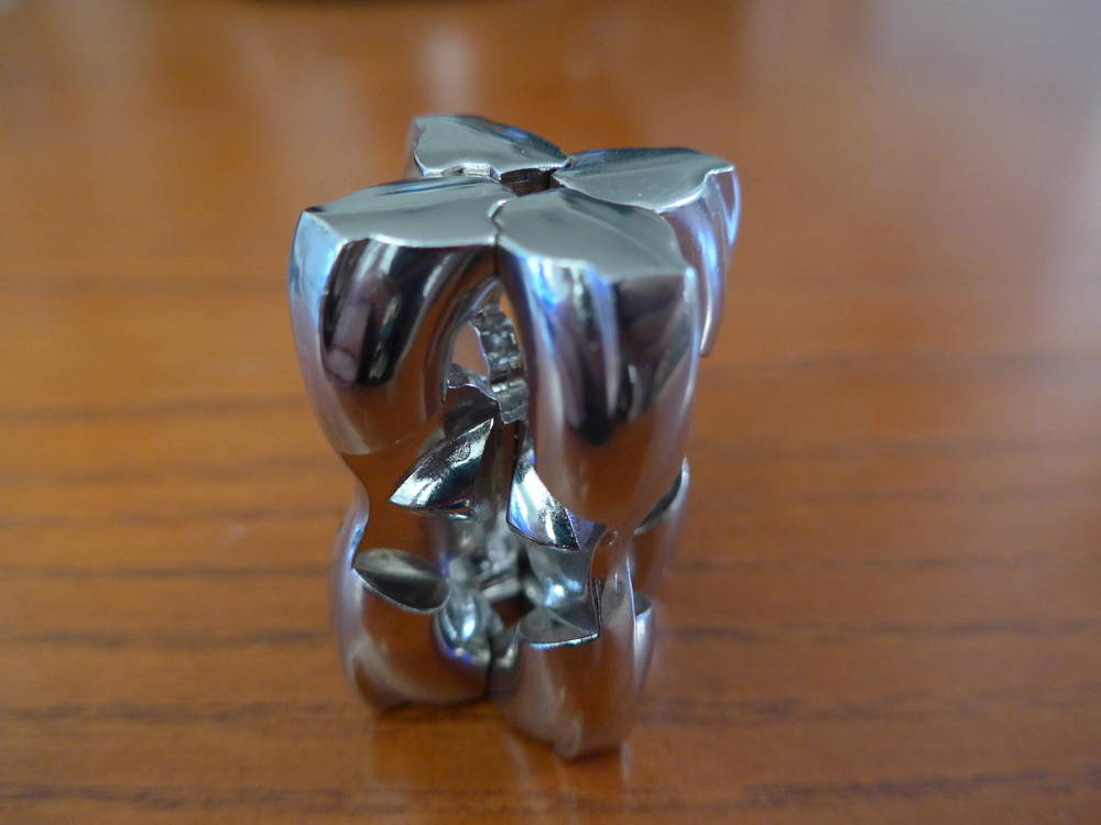 Solving Twopart Metal Puzzles Theory and Practice