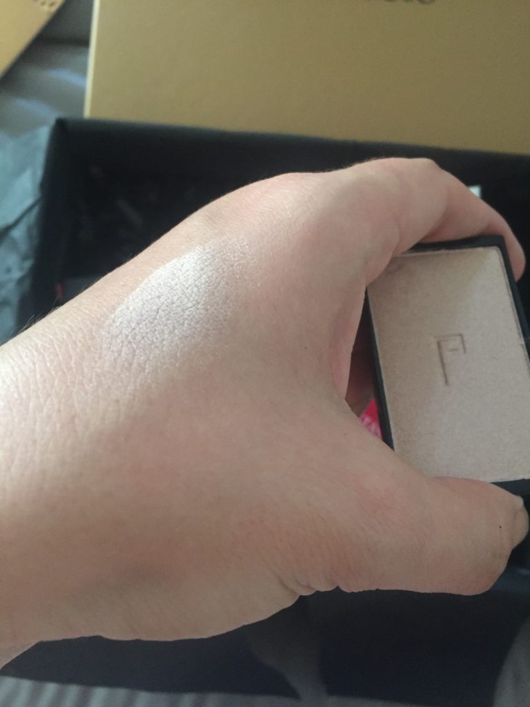 Doucce highlighter swatch on hand