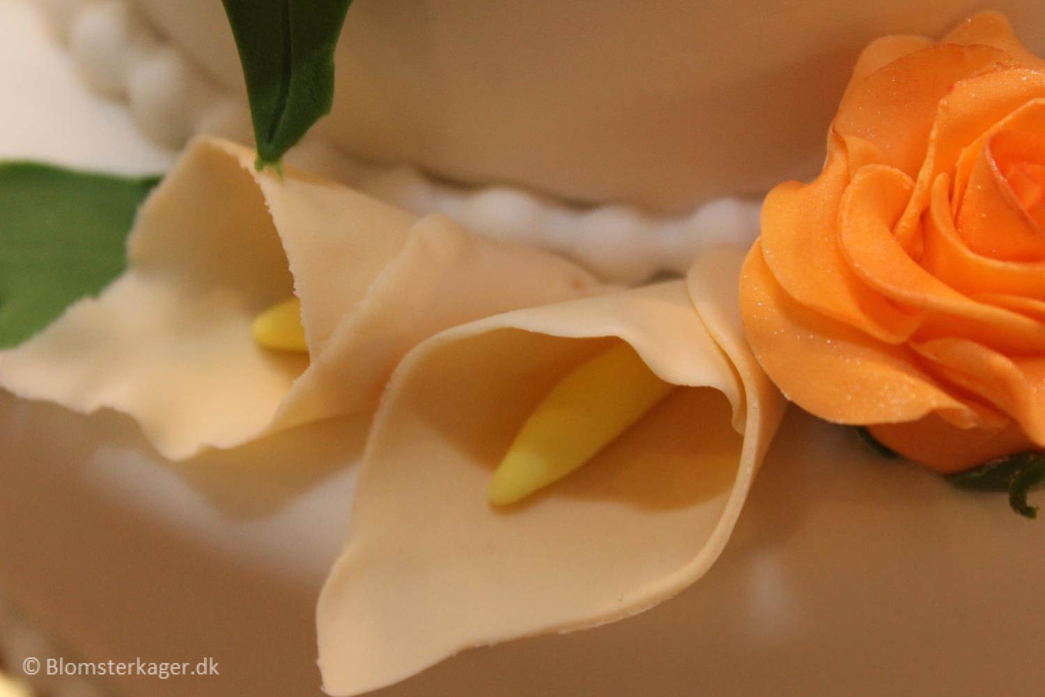 Wedding Cake with roses and calla lilies