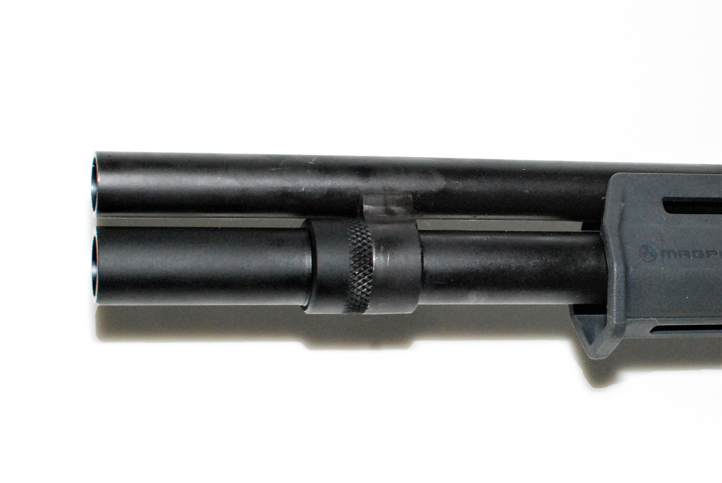 magazine extension tubes for pump action shotguns
