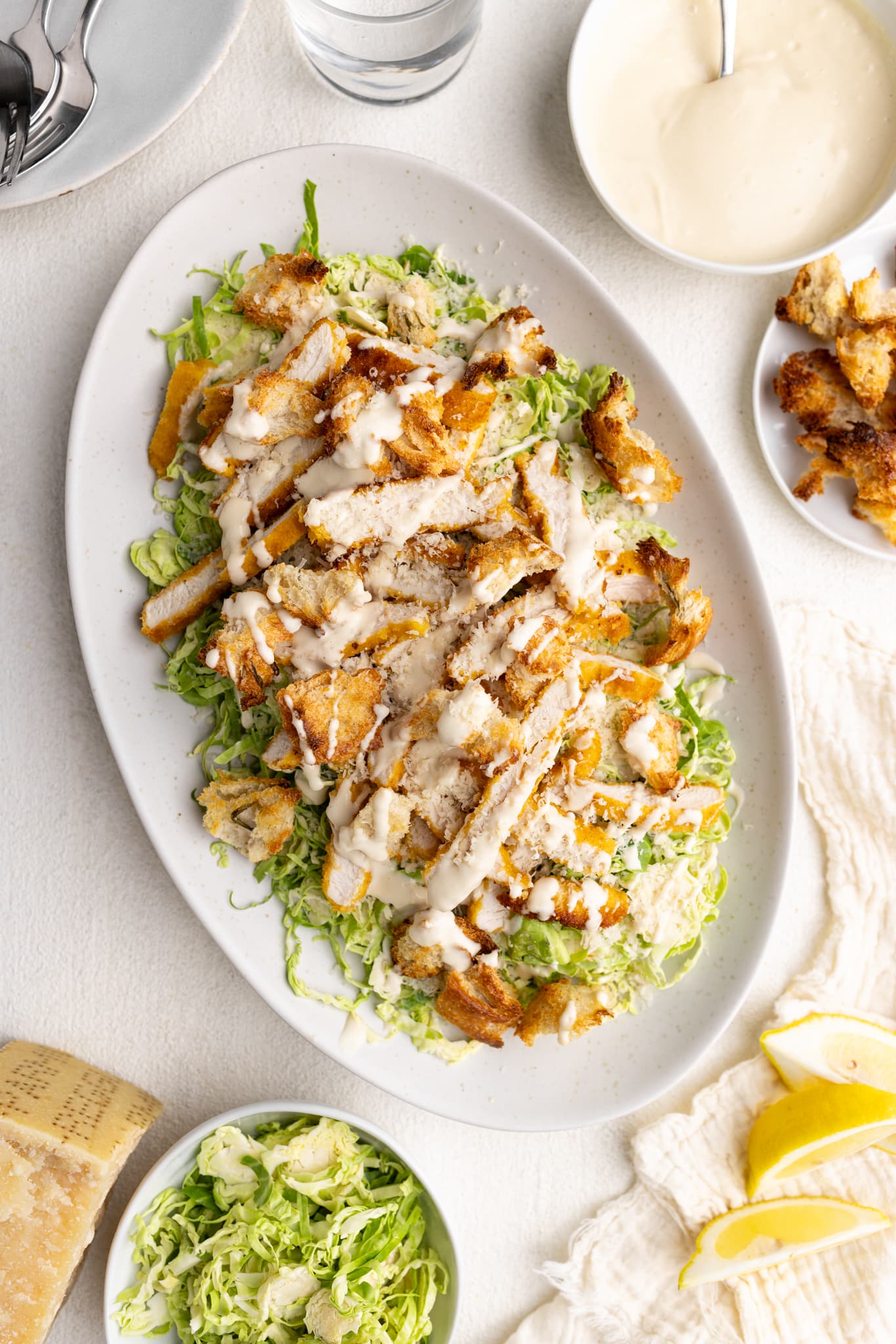 Brussels Sprout Salad (with a Roasted Garlic Caesar Dressing) The