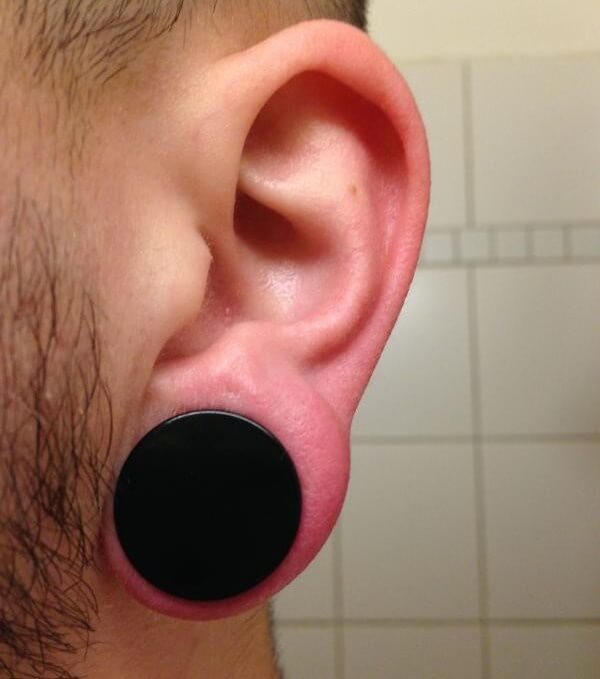 77 Rocking Plug Piercing Ideas To Try This Year Border Tattoo