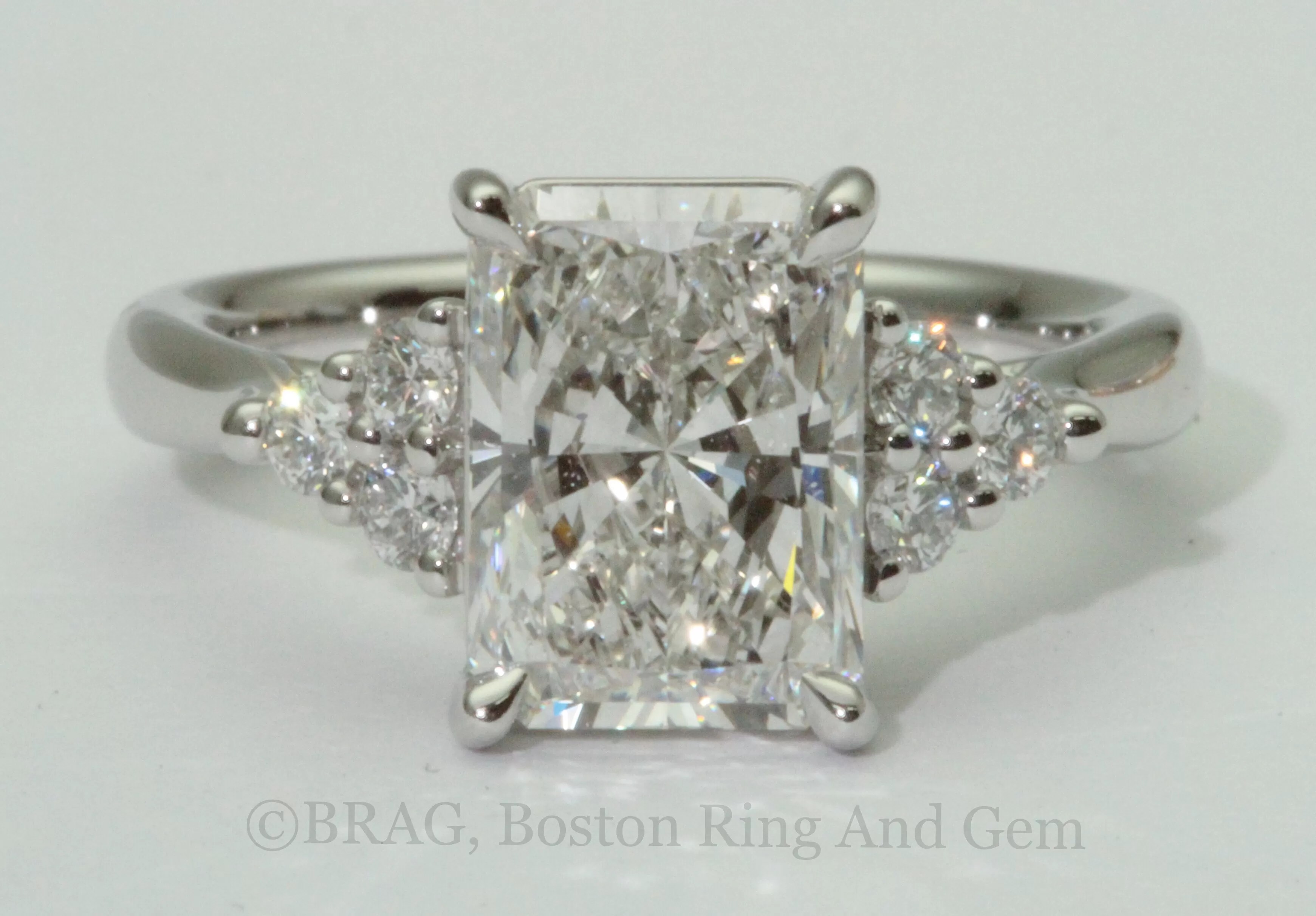 Rectangle radiant cut center diamond with round brilliant cut side