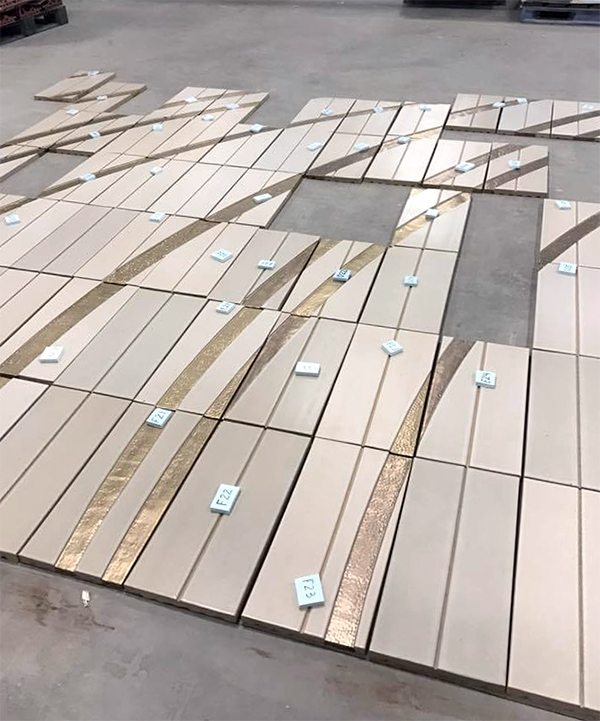 Pacific Gate Condominiums, KPF, Terra Cotta Entry Wall, Rising Sun