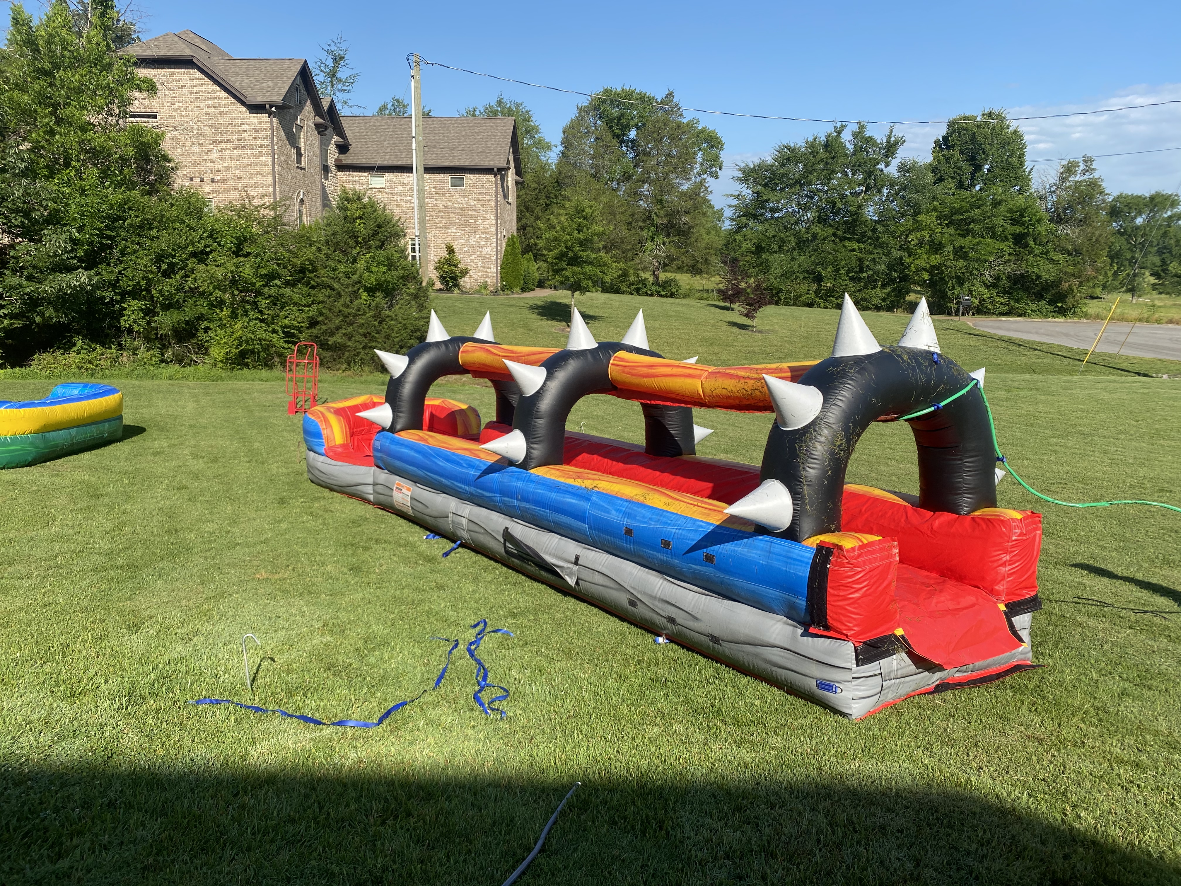 Rocker Slip n Slide Inflatable Bounce Houses & Water Slides for Rent