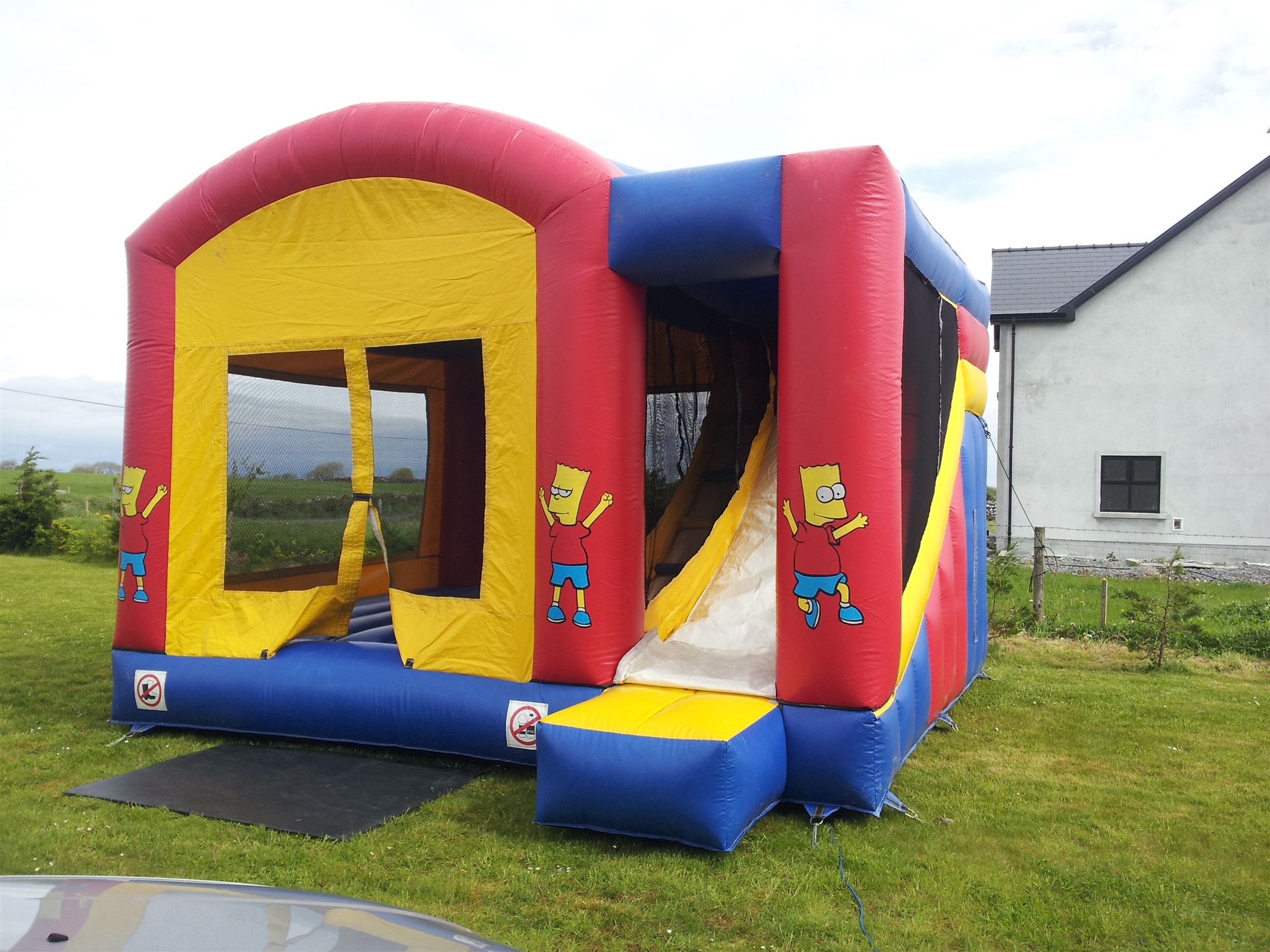 Simpsons Combi Bounce n Slide Bouncy Castle Hire, Quad Cars Hire in