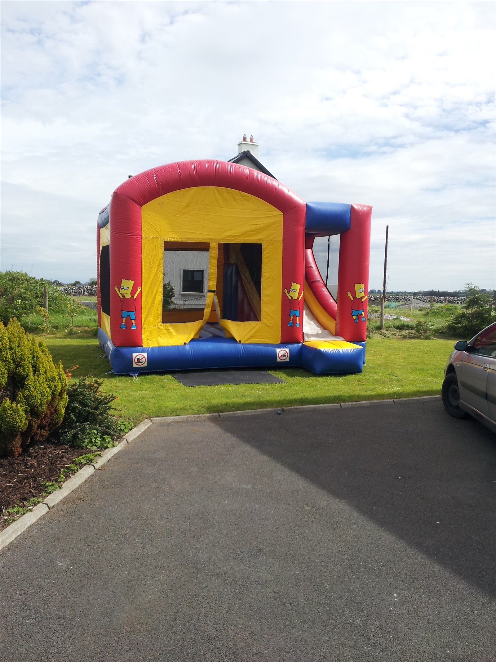 Simpsons Combi Bounce n Slide Bouncy Castle Hire, Quad Cars Hire in