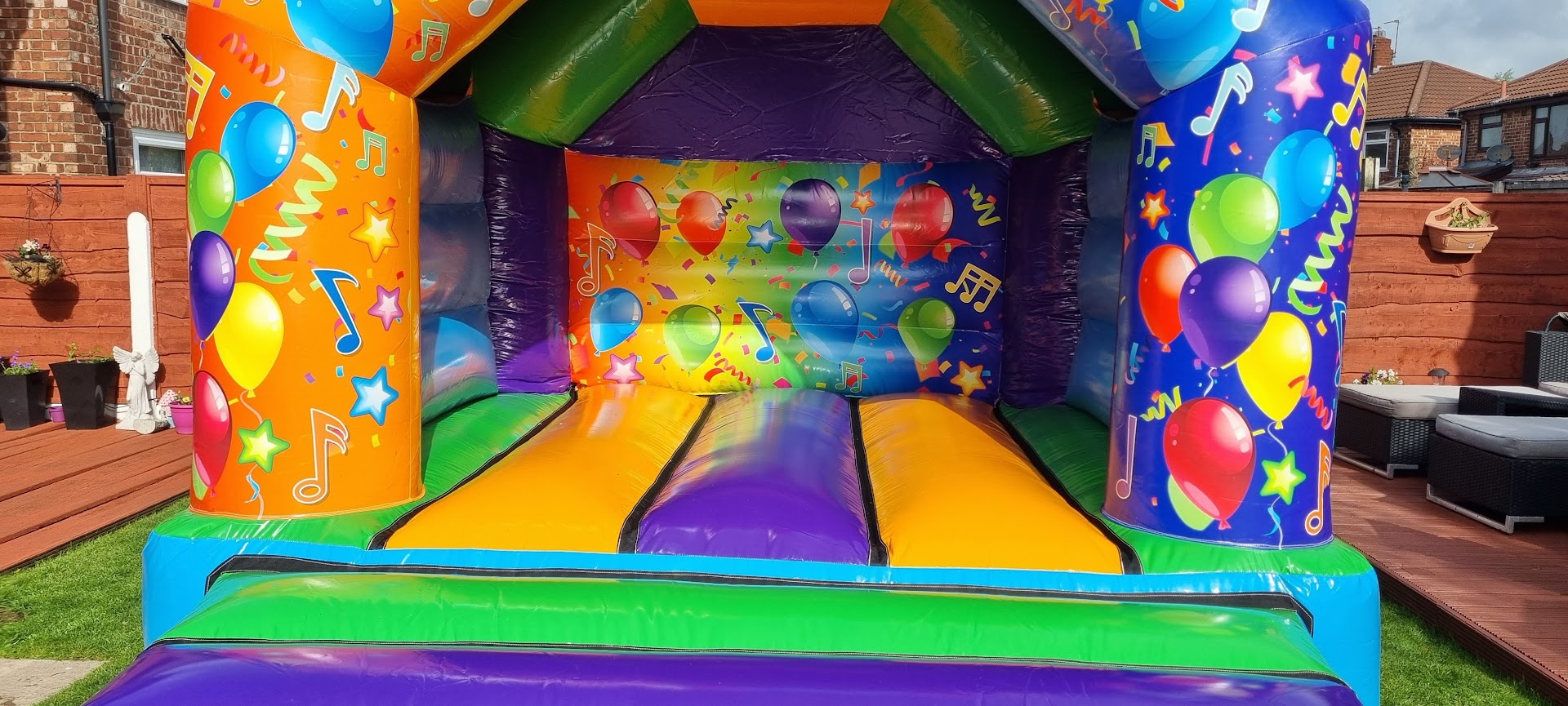 Multi Coloured Party Time Bouncy Castle Hire Born 2 Bounce
