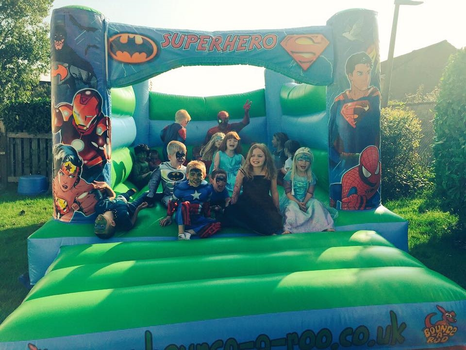Superhero Theme Bouncy Castle 11ft x 15ft Bouncy Castle Hire in West