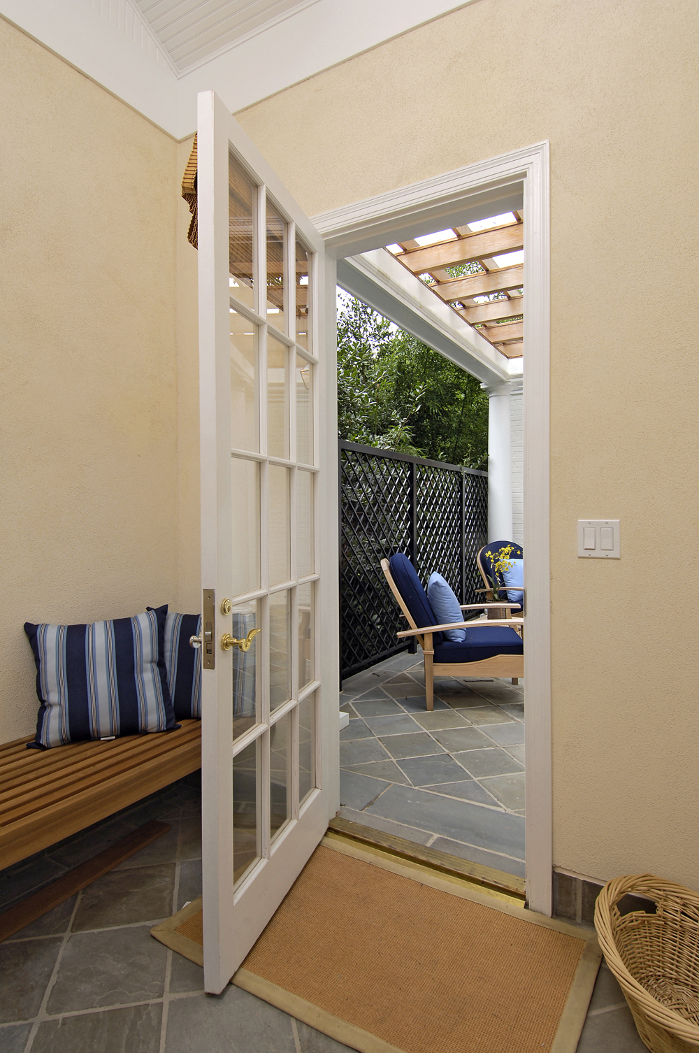 Pool House Addition on Raised Terrace Creates Stunning Outdoor Space in