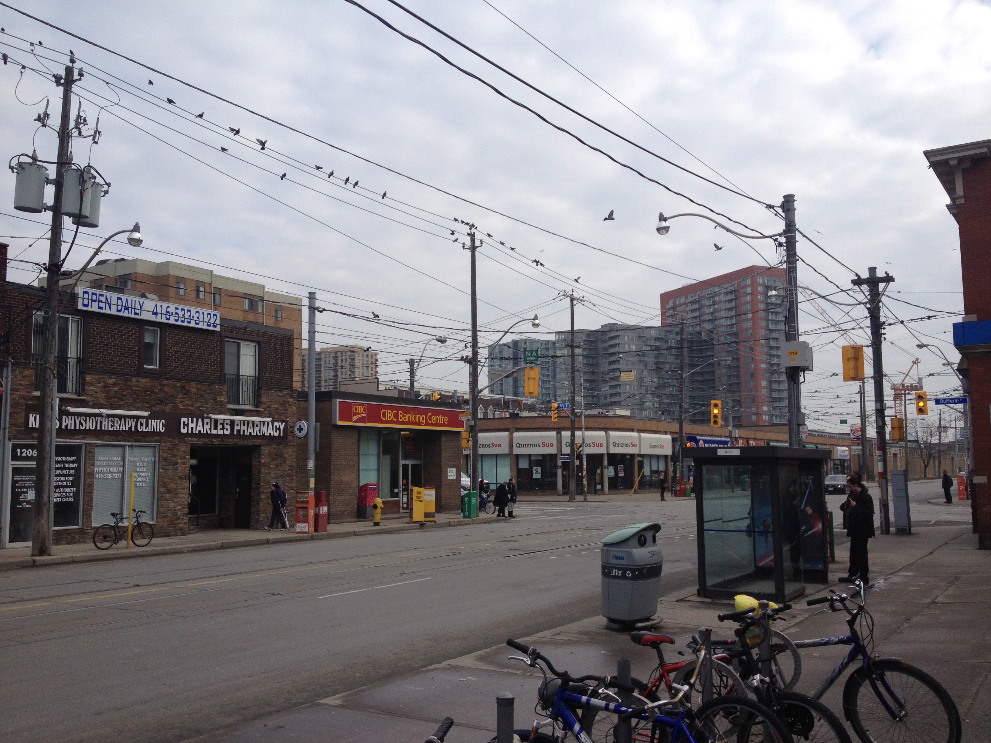 Having breakfast at the corner of King and Dufferin. By