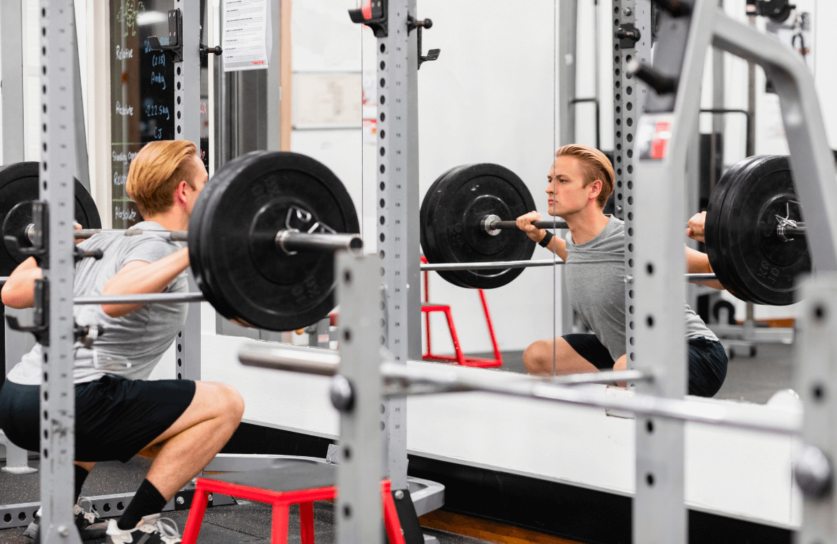 Smith Machine vs. Squat Rack Which Machine is The Best?