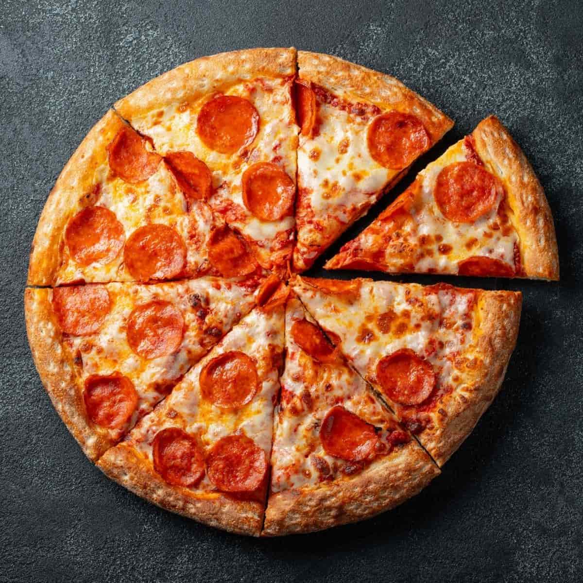 30+ Cheesy Pizza Puns Box of Puns