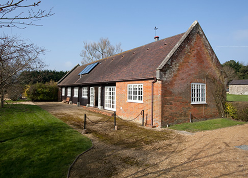 Barton tennis in walled garden with flowers Images The Barton Estate, Isle of Wight
